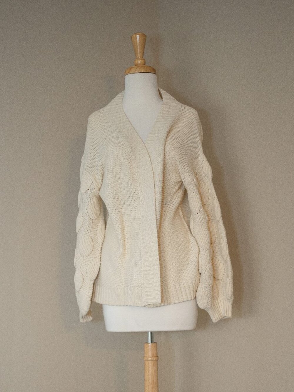 Chunky cardigan with pom pom sleeves